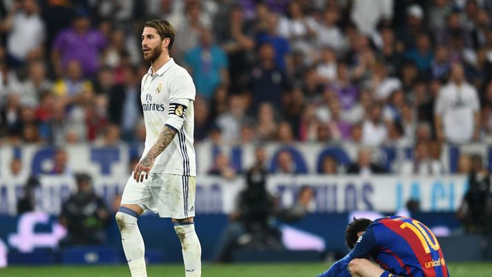 MADRID, SPAIN - APRIL 23: Sergio Ramos of Real Madrid walks past Lionel Messi of Barcelona as he is sent off during the La Liga match between Real Madrid CF and FC Barcelona at Estadio Bernabeu on April 23, 2017 in Madrid, Spain. (Photo by David Ramos/Getty Images) MADRID, SPAIN - APRIL 23: Sergio Ramos of Real Madrid walks past Lionel Messi of Barcelona as he is sent off during the La Liga match between Real Madrid CF and FC Barcelona at Estadio Bernabeu on April 23, 2017 in Madrid, Spain. (Photo by David Ramos/Getty Images)