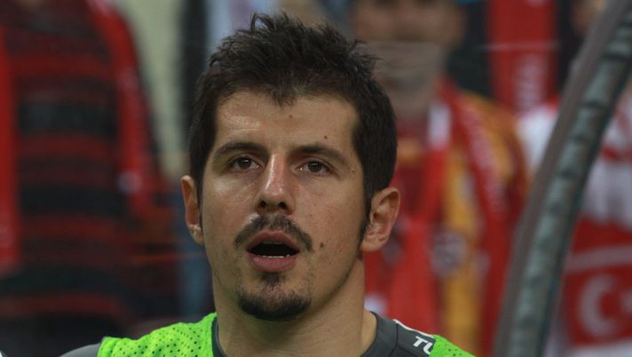 ISTANBUL, TURKEY - OCTOBER 07: Emre Beloezoglu of Turkey pose at the line up prior the UEFA EURO 2012 Group A qualifying match between Turkey and Germany at Tuerk Telekom Arena on October 7, 2011 in Istanbul, Turkey. (Photo by Alexander Hassenstein/Bongarts/Getty Images) ISTANBUL, TURKEY - OCTOBER 07: Emre Beloezoglu of Turkey pose at the line up prior the UEFA EURO 2012 Group A qualifying match between Turkey and Germany at Tuerk Telekom Arena on October 7, 2011 in Istanbul, Turkey. (Photo by Alexander Hassenstein/Bongarts/Getty Images)