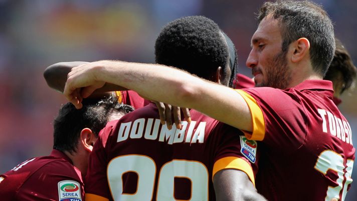 ROME, ITALY - MAY 03: Seydou Doumbia (C) with his teammates of AS Roma celebrates after scoring the opening goal during the Serie A match between AS Roma and Genoa CFC at Stadio Olimpico on May 3, 2015 in Rome, Italy. (Photo by Paolo Bruno/Getty Images) ROME, ITALY - MAY 03: Seydou Doumbia (C) with his teammates of AS Roma celebrates after scoring the opening goal during the Serie A match between AS Roma and Genoa CFC at Stadio Olimpico on May 3, 2015 in Rome, Italy. (Photo by Paolo Bruno/Getty Images)