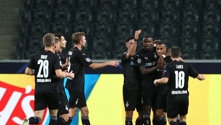MOENCHENGLADBACH, GERMANY - OCTOBER 27: Marcus Thuram of Borussia Moenchengladbach celebrates with teammates after scoring his sides first goal during the UEFA Champions League Group B stage match between Borussia Moenchengladbach and Real Madrid at Borussia-Park on October 27, 2020 in Moenchengladbach, Germany. Football Stadiums around Europe remain empty due to the Coronavirus Pandemic as Government social distancing laws prohibit fans inside venues resulting in fixtures being played behind closed doors. (Photo by Lars Baron/Getty Images) MOENCHENGLADBACH, GERMANY - OCTOBER 27: Marcus Thuram of Borussia Moenchengladbach celebrates with teammates after scoring his sides first goal during the UEFA Champions League Group B stage match between Borussia Moenchengladbach and Real Madrid at Borussia-Park on October 27, 2020 in Moenchengladbach, Germany. Football Stadiums around Europe remain empty due to the Coronavirus Pandemic as Government social distancing laws prohibit fans inside venues resulting in fixtures being played behind closed doors. (Photo by Lars Baron/Getty Images)