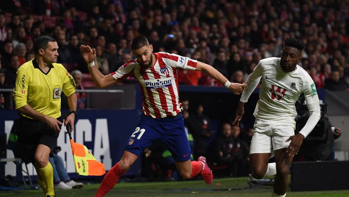 MADRID, SPAIN - FEBRUARY 08: Yannick Carrasco of Atletico Madrid battles for possession with Yan Brice of Granada CF during the Liga match between Club Atletico de Madrid and Granada CF at Wanda Metropolitano on February 08, 2020 in Madrid, Spain. (Photo by Denis Doyle/Getty Images) MADRID, SPAIN - FEBRUARY 08: Yannick Carrasco of Atletico Madrid battles for possession with Yan Brice of Granada CF during the Liga match between Club Atletico de Madrid and Granada CF at Wanda Metropolitano on February 08, 2020 in Madrid, Spain. (Photo by Denis Doyle/Getty Images)