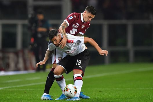 TURIN, ITALY - SEPTEMBER 26: Daniele Baselli (R) of Torino FC competes with Theo Hernandez of AC Milan during the Serie A match between Torino FC and AC Milan at Stadio Olimpico di Torino on September 26, 2019 in Turin, Italy. (Photo by Valerio Pennicino/Getty Images) TURIN, ITALY - SEPTEMBER 26: Daniele Baselli (R) of Torino FC competes with Theo Hernandez of AC Milan during the Serie A match between Torino FC and AC Milan at Stadio Olimpico di Torino on September 26, 2019 in Turin, Italy. (Photo by Valerio Pennicino/Getty Images)