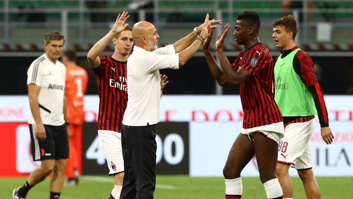 MILAN, ITALY - JULY 07:  AC Milan coach Stefano Pioli and Rafael Leao celebrate a victory at the end of the Serie A match between AC Milan and Juventus at Stadio Giuseppe Meazza on July 7, 2020 in Milan, Italy.  (Photo by Marco Luzzani/Getty Images) 