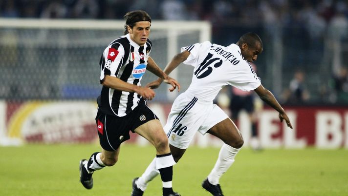 TURIN - MAY 14: Alessio Tacchinardi of Juventus is tackled by Flavio Conceicao of Real Madrid during the UEFA Champions League semi final, second leg match between Juventus and Real Madrid on May 14, 2003 at the Stadio Delle Alpi in Turin, Italy. Juventus won the match 3-1 and 4-3 on aggregate. (Photo by Clive Mason/Getty Images) TURIN - MAY 14: Alessio Tacchinardi of Juventus is tackled by Flavio Conceicao of Real Madrid during the UEFA Champions League semi final, second leg match between Juventus and Real Madrid on May 14, 2003 at the Stadio Delle Alpi in Turin, Italy. Juventus won the match 3-1 and 4-3 on aggregate. (Photo by Clive Mason/Getty Images)