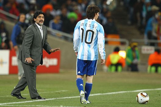 JOHANNESBURG, SOUTH AFRICA - JUNE 27: Diego Maradona head coach of Argentina gestures to Lionel Messi of Argentina during to the 2010 FIFA World Cup South Africa Round of Sixteen match between Argentina and Mexico at Soccer City Stadium on June 27, 2010 in Johannesburg, South Africa. (Photo by Richard Heathcote/Getty Images) JOHANNESBURG, SOUTH AFRICA - JUNE 27: Diego Maradona head coach of Argentina gestures to Lionel Messi of Argentina during to the 2010 FIFA World Cup South Africa Round of Sixteen match between Argentina and Mexico at Soccer City Stadium on June 27, 2010 in Johannesburg, South Africa. (Photo by Richard Heathcote/Getty Images)