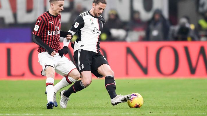 MILAN, ITALY - FEBRUARY 13: Adrien Rabiot of Juventus competes for the ball with Alexis Jesse Saelemaekers of AC Milan during the Coppa Italia Semi Final match between AC Milan and Juventus at Stadio Giuseppe Meazza on February 13, 2020 in Milan, Italy. (Photo by Daniele Badolato - Juventus FC/Juventus FC via Getty Images) MILAN, ITALY - FEBRUARY 13: Adrien Rabiot of Juventus competes for the ball with Alexis Jesse Saelemaekers of AC Milan during the Coppa Italia Semi Final match between AC Milan and Juventus at Stadio Giuseppe Meazza on February 13, 2020 in Milan, Italy. (Photo by Daniele Badolato - Juventus FC/Juventus FC via Getty Images)