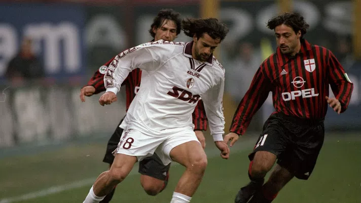 12 Dec 1999:  Gianluigi Lentini of Torino is closed down by the AC Milan defence during the Italian Serie A match played at the San Siro in Milan, Italy. The game finished in a 2-0 win for Milan.  Mandatory Credit: Claudio Villa /Allsport