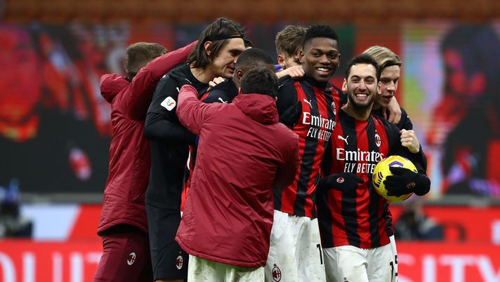 MILAN, ITALY - JANUARY 12: Hakan Calhanoglu of A.C. Milan celebrates with Rafael Leao after scoring the winning penalty during a penalty shoot out during the Coppa Italia match between AC Milan and Torino FC at Stadio Giuseppe Meazza on January 12, 2021 in Milan, Italy. Sporting stadiums around Italy remain under strict restrictions due to the Coronavirus Pandemic as Government social distancing laws prohibit fans inside venues resulting in games being played behind closed doors. (Photo by Marco Luzzani/Getty Images) MILAN, ITALY - JANUARY 12: Hakan Calhanoglu of A.C. Milan celebrates with Rafael Leao after scoring the winning penalty during a penalty shoot out during the Coppa Italia match between AC Milan and Torino FC at Stadio Giuseppe Meazza on January 12, 2021 in Milan, Italy. Sporting stadiums around Italy remain under strict restrictions due to the Coronavirus Pandemic as Government social distancing laws prohibit fans inside venues resulting in games being played behind closed doors. (Photo by Marco Luzzani/Getty Images)