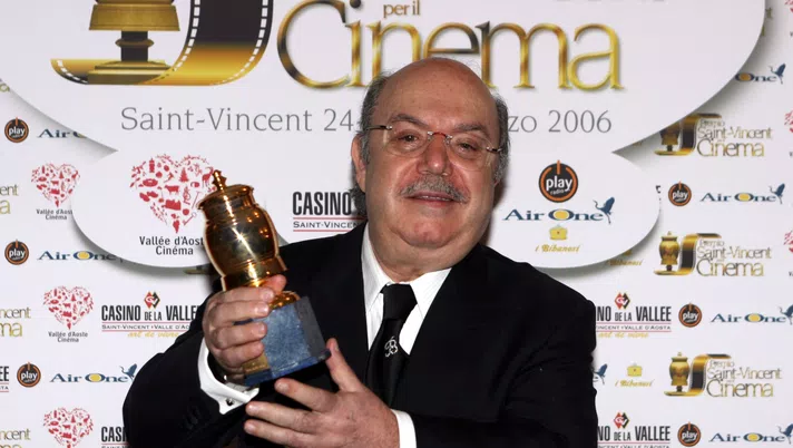SAINT VINCENT, ITALY - MARCH 25:   Actor Lino Banfi shows his award at Grolle d'Oro Italian Movie Awards at the Hotel Billia on March 25, 2006 in Saint Vincent, Italy. (Photo Elisabetta Villa/Getty Images)