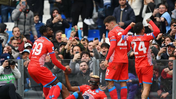 NAPLES, ITALY - MARCH 19: Victor Osimhen of SSC Napoli celebrates with teammates Andre-Frank Zambo Anguissa, Giovanni Di Lorenzo and Lorenzo Insigne after scoring their team's second goal during the Serie A match between SSC Napoli and Udinese Calcio at Stadio Diego Armando Maradona on March 19, 2022 in Naples, Italy. (Photo by Francesco Pecoraro/Getty Images) NAPLES, ITALY - MARCH 19: Victor Osimhen of SSC Napoli celebrates with teammates Andre-Frank Zambo Anguissa, Giovanni Di Lorenzo and Lorenzo Insigne after scoring their team's second goal during the Serie A match between SSC Napoli and Udinese Calcio at Stadio Diego Armando Maradona on March 19, 2022 in Naples, Italy. (Photo by Francesco Pecoraro/Getty Images)