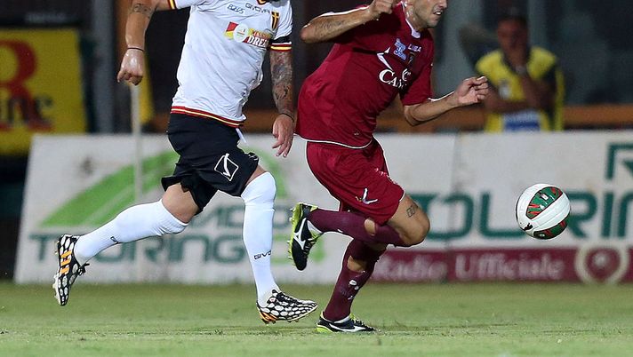 REGGIO CALABRIA, ITALY - SEPTEMBER 12: Jacopo Dall'Oglio (R) of Reggina competes for the ball with Elio Nigro of Messina during the Lega Pro match between Reggina Calcio and ACR Messina at Stadio Oreste Granillo on September 12, 2014 in Reggio Calabria, Italy. (Photo by Maurizio Lagana/Getty Images) REGGIO CALABRIA, ITALY - SEPTEMBER 12: Jacopo Dall'Oglio (R) of Reggina competes for the ball with Elio Nigro of Messina during the Lega Pro match between Reggina Calcio and ACR Messina at Stadio Oreste Granillo on September 12, 2014 in Reggio Calabria, Italy. (Photo by Maurizio Lagana/Getty Images)