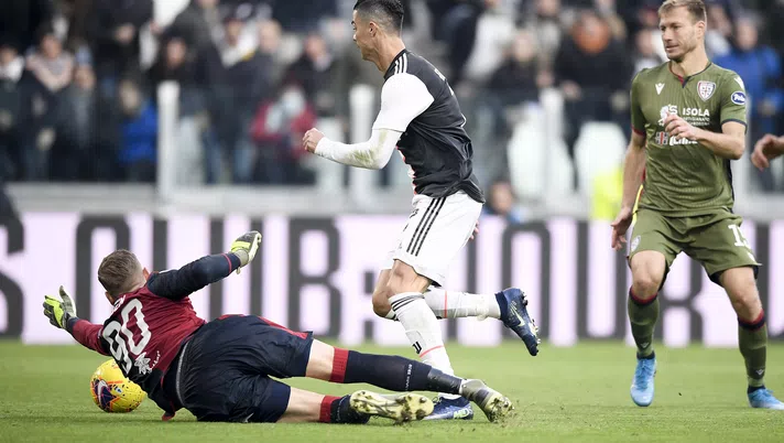 TURIN, ITALY - JANUARY 06:  Cristiano Ronaldo of Juventus scores the opening goal during the Serie A match between Juventus and Cagliari Calcio at Allianz Stadium on January 6, 2020 in Turin, Italy.  (Photo by Daniele Badolato - Juventus FC/Juventus FC via Getty Images)