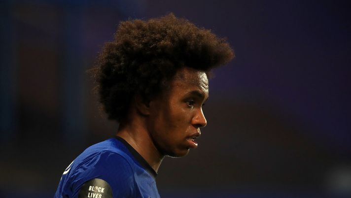 LONDON, ENGLAND - JULY 14: A Black Lives Matter movement logo is seen on the shirt sleeve of Willian of Chelsea during the Premier League match between Chelsea FC and Norwich City at Stamford Bridge on July 14, 2020 in London, England. Football Stadiums around Europe remain empty due to the Coronavirus Pandemic as Government social distancing laws prohibit fans inside venues resulting in all fixtures being played behind closed doors. (Photo by Adam Davy/Pool via Getty Images) LONDON, ENGLAND - JULY 14: A Black Lives Matter movement logo is seen on the shirt sleeve of Willian of Chelsea during the Premier League match between Chelsea FC and Norwich City at Stamford Bridge on July 14, 2020 in London, England. Football Stadiums around Europe remain empty due to the Coronavirus Pandemic as Government social distancing laws prohibit fans inside venues resulting in all fixtures being played behind closed doors. (Photo by Adam Davy/Pool via Getty Images)