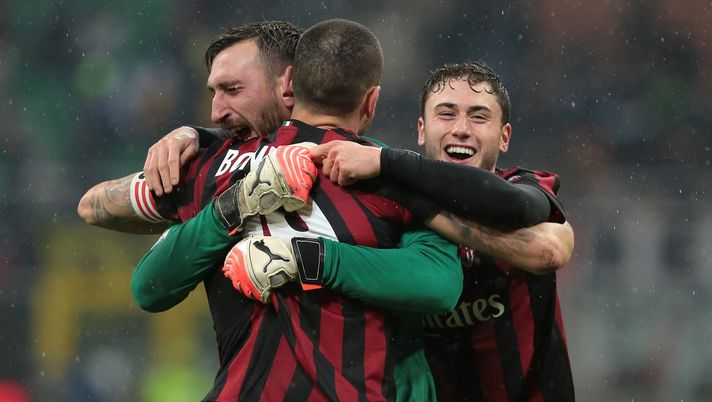 MILAN, ITALY - DECEMBER 27: Antonio Donnarumma of AC Milan celebrates the victory with his teammates Leonardo Bonucci and Davide Calabria at the end of the TIM Cup match between AC Milan and FC Internazionale at Stadio Giuseppe Meazza on December 27, 2017 in Milan, Italy. (Photo by Emilio Andreoli/Getty Images) MILAN, ITALY - DECEMBER 27: Antonio Donnarumma of AC Milan celebrates the victory with his teammates Leonardo Bonucci and Davide Calabria at the end of the TIM Cup match between AC Milan and FC Internazionale at Stadio Giuseppe Meazza on December 27, 2017 in Milan, Italy. (Photo by Emilio Andreoli/Getty Images)