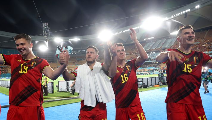SEVILLE, SPAIN - JUNE 27: Leander Dendoncker, Eden Hazard, Thorgan Hazard and Thomas Meunier of Belgium celebrate their side's victory towards the fans after the UEFA Euro 2020 Championship Round of 16 match between Belgium and Portugal at Estadio La Cartuja on June 27, 2021 in Seville, Spain. (Photo by Alexander Hassenstein/Getty Images) 