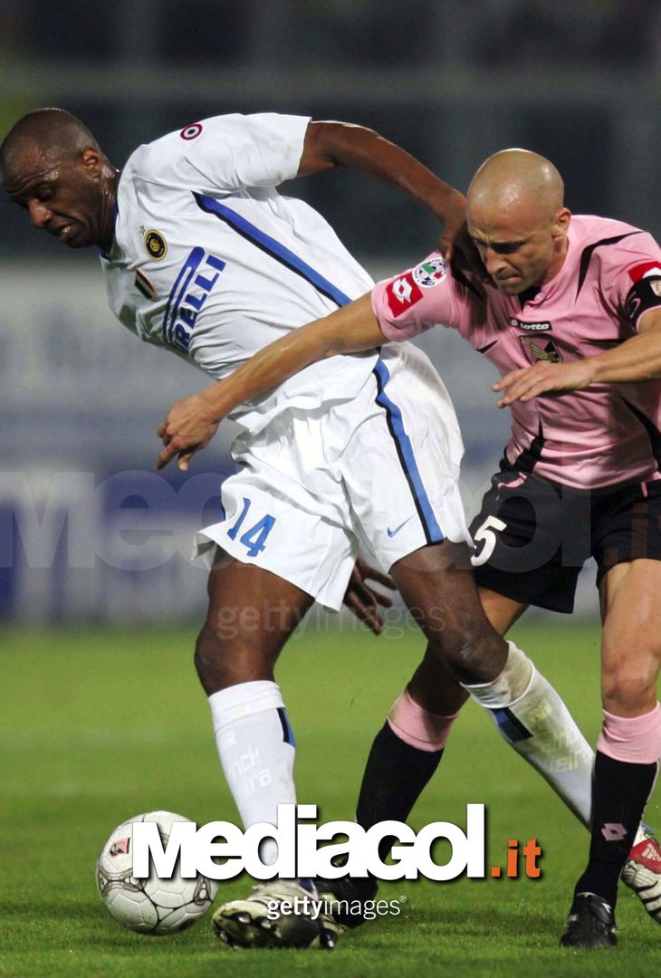  PALERMO, ITALY - NOVEMBER 26:  Patrick Vieira of Inter Milan challenges Eugenio Corini of Palermo during Italian serie A football match against Palermo at Palermo's Renzo Barbera Stadium, 26 November 2006 in Palermo, Italy.  (Photo by New Press/Getty Images) 