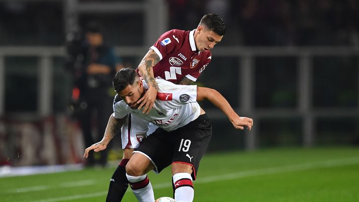 Daniele Baselli e Theo Hernandez in Torino-Milan, Getty Images 