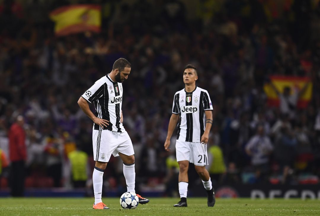  CARDIFF, WALES - JUNE 03: Gonzalo Higuain of Juventus and Paulo Dybala of Juventus look dejected during the UEFA Champions League Final between Juventus and Real Madrid at National Stadium of Wales on June 3, 2017 in Cardiff, Wales.  (Photo by David Ramos/Getty Images) 