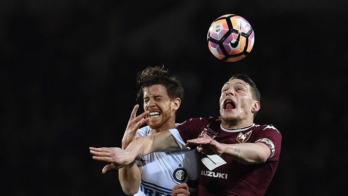 TURIN, ITALY - MARCH 18: Andrea Belotti (R) of FC Torino clashes with Cristian Ansaldi of FC Internazionale during the Serie A match between FC Torino and FC Internazionale at Stadio Olimpico di Torino on March 18, 2017 in Turin, Italy. (Photo by Valerio Pennicino/Getty Images) TURIN, ITALY - MARCH 18: Andrea Belotti (R) of FC Torino clashes with Cristian Ansaldi of FC Internazionale during the Serie A match between FC Torino and FC Internazionale at Stadio Olimpico di Torino on March 18, 2017 in Turin, Italy. (Photo by Valerio Pennicino/Getty Images)