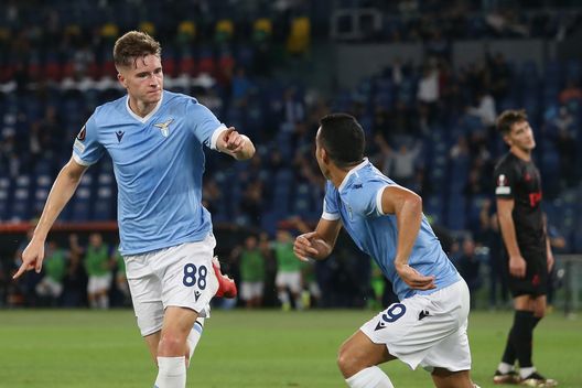 ROME, ITALY - SEPTEMBER 30: Toma Basic of SS Lazio celebrates with team mate Pedro after scoring their sides first goal during the UEFA Europa League group E match between SS Lazio and Lokomotiv Moskva at Olimpico Stadium on September 30, 2021 in Rome, Italy. (Photo by Paolo Bruno/Getty Images) ROME, ITALY - SEPTEMBER 30: Toma Basic of SS Lazio celebrates with team mate Pedro after scoring their sides first goal during the UEFA Europa League group E match between SS Lazio and Lokomotiv Moskva at Olimpico Stadium on September 30, 2021 in Rome, Italy. (Photo by Paolo Bruno/Getty Images)