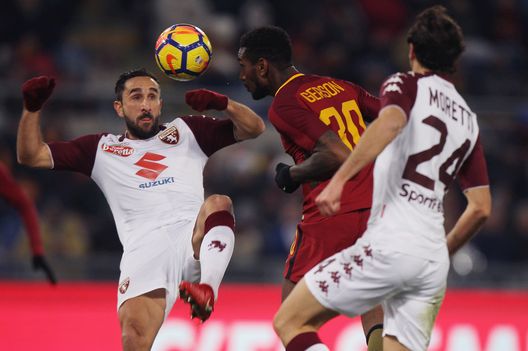 ROME, ITALY - DECEMBER 20: Gerson of AS Roma competes for the ball with Cristian Molinaro of Torino FC during the TIM Cup match between AS Roma and Torino FC at Olimpico Stadium on December 20, 2017 in Rome, Italy. (Photo by Paolo Bruno/Getty Images) ROME, ITALY - DECEMBER 20: Gerson of AS Roma competes for the ball with Cristian Molinaro of Torino FC during the TIM Cup match between AS Roma and Torino FC at Olimpico Stadium on December 20, 2017 in Rome, Italy. (Photo by Paolo Bruno/Getty Images)