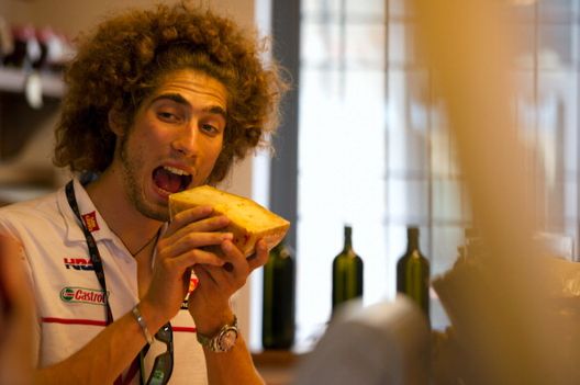 SCARPERIA, ITALY - JUNE 30: Marco Simoncelli of Italy and San Carlo Honda Gresini and other riders visit Il Palagiaccio and learn how to make ricotta cheese during the MotoGp of Italy on June 30, 2011 in Scarperia near Florence, Italy. (Photo by Mirco Lazzari gp/Getty Images)
