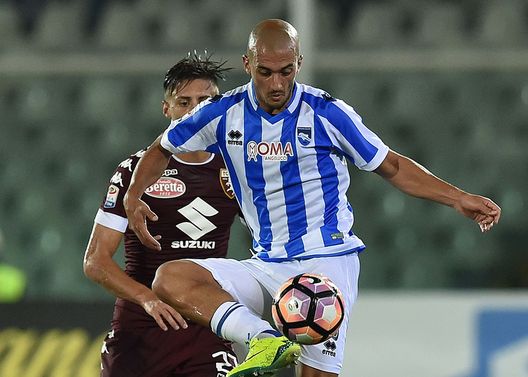 PESCARA, ITALY - SEPTEMBER 21: Ahmad Benali of Pescara Calcio and Antonio Barreca of FC Torino in action during the Serie A match between Pescara Calcio and FC Torino at Adriatico Stadium on September 21, 2016 in Pescara, Italy. (Photo by Giuseppe Bellini/Getty Images) PESCARA, ITALY - SEPTEMBER 21: Ahmad Benali of Pescara Calcio and Antonio Barreca of FC Torino in action during the Serie A match between Pescara Calcio and FC Torino at Adriatico Stadium on September 21, 2016 in Pescara, Italy. (Photo by Giuseppe Bellini/Getty Images)