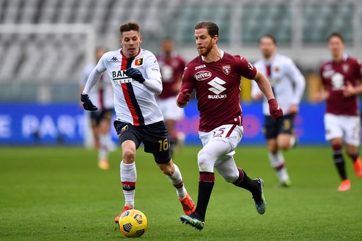 TURIN, ITALY - FEBRUARY 13: Cristian Ansaldi of Torino FC runs with the ball under pressure from Miha Zajc of Genoa C.F.C. during the Serie A match between Torino FC and Genoa CFC at Stadio Olimpico di Torino on February 13, 2021 in Turin, Italy. Sporting stadiums around Italy remain under strict restrictions due to the Coronavirus Pandemic as Government social distancing laws prohibit fans inside venues resulting in games being played behind closed doors. (Photo by Valerio Pennicino/Getty Images) TURIN, ITALY - FEBRUARY 13: Cristian Ansaldi of Torino FC runs with the ball under pressure from Miha Zajc of Genoa C.F.C. during the Serie A match between Torino FC and Genoa CFC at Stadio Olimpico di Torino on February 13, 2021 in Turin, Italy. Sporting stadiums around Italy remain under strict restrictions due to the Coronavirus Pandemic as Government social distancing laws prohibit fans inside venues resulting in games being played behind closed doors. (Photo by Valerio Pennicino/Getty Images)