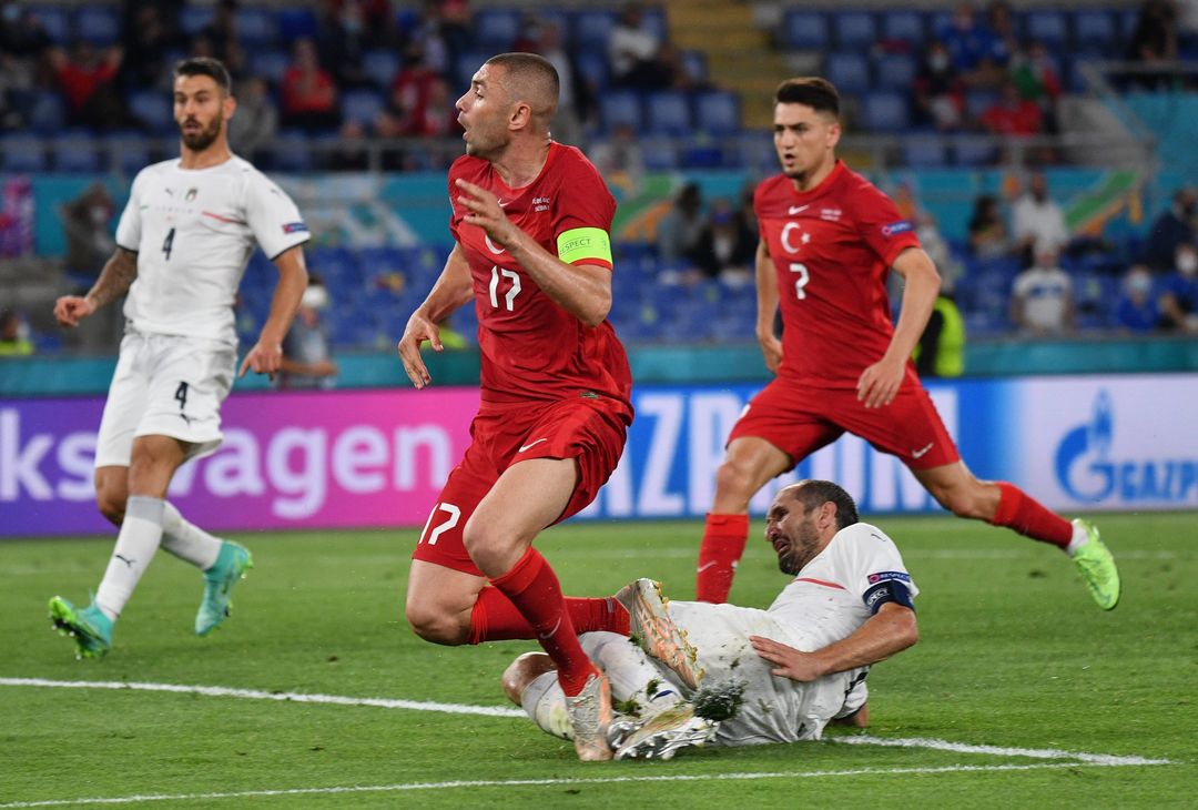  ROME, ITALY - JUNE 11: Burak Yilmaz of Turkey is challenged by Giorgio Chiellini of Italy during the UEFA Euro 2020 Championship Group A match between Turkey and Italy at the Stadio Olimpico on June 11, 2021 in Rome, Italy. (Photo by Filippo Monteforte - Pool/Getty Images) 