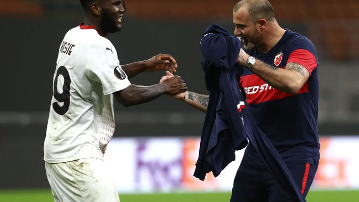 MILAN, ITALY - FEBRUARY 25: Dejan Stankovic, Head Coach of Red Star Belgrade celebrates with Franck Kessie of Milan after the UEFA Europa League Round of 32 match between AC Milan and Crvena Zvezda at San Siro Stadium on February 25, 2021 in Milan, Italy. Sporting stadiums around Italy remain under strict restrictions due to the Coronavirus Pandemic as Government social distancing laws prohibit fans inside venues resulting in games being played behind closed doors. (Photo by Marco Luzzani/Getty Images) MILAN, ITALY - FEBRUARY 25: Dejan Stankovic, Head Coach of Red Star Belgrade celebrates with Franck Kessie of Milan after the UEFA Europa League Round of 32 match between AC Milan and Crvena Zvezda at San Siro Stadium on February 25, 2021 in Milan, Italy. Sporting stadiums around Italy remain under strict restrictions due to the Coronavirus Pandemic as Government social distancing laws prohibit fans inside venues resulting in games being played behind closed doors. (Photo by Marco Luzzani/Getty Images)