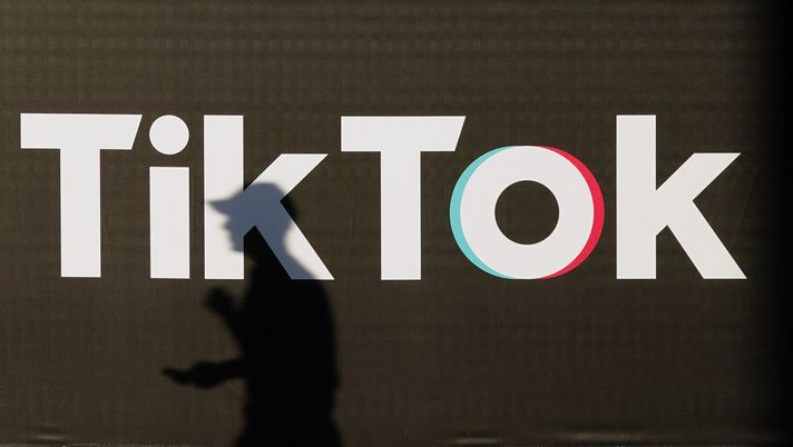 BERLIN, GERMANY - SEPTEMBER 21: A young man holding a smartphone casts a shadow as he walks past an advertisement for social media company TikTok on September 21, 2020 in Berlin, Germany. U.S. President Donald Trump has given preliminary approval for Oracle, Walmart and other investors to take over TikTok and create a new U.S.-based company called TikTok Global. (Photo by Sean Gallup/Getty Images) BERLIN, GERMANY - SEPTEMBER 21: A young man holding a smartphone casts a shadow as he walks past an advertisement for social media company TikTok on September 21, 2020 in Berlin, Germany. U.S. President Donald Trump has given preliminary approval for Oracle, Walmart and other investors to take over TikTok and create a new U.S.-based company called TikTok Global. (Photo by Sean Gallup/Getty Images)