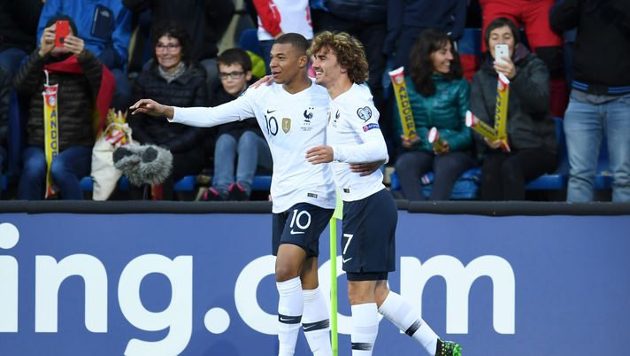 ANDORRA LA VELLA, ANDORRA - JUNE 11: Kylian Mbappe of France celebrates with teammate Antoine Griezmann of France after scoring his team's first goal during the UEFA Euro 2020 Qualification match between Andorra and France on June 11, 2019 in Andorra la Vella, Andorra. (Photo by David Ramos/Getty Images) ANDORRA LA VELLA, ANDORRA - JUNE 11: Kylian Mbappe of France celebrates with teammate Antoine Griezmann of France after scoring his team's first goal during the UEFA Euro 2020 Qualification match between Andorra and France on June 11, 2019 in Andorra la Vella, Andorra. (Photo by David Ramos/Getty Images)