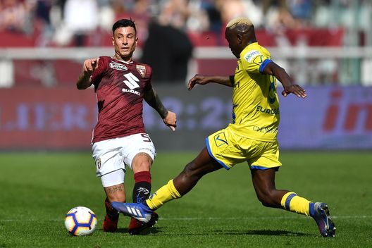 TURIN, ITALY - MARCH 03: Armando Izzo (L) of Torino FC is challenged by Assane Diousse of Chievo during the Serie A match between Torino FC and Chievo at Stadio Olimpico di Torino on March 3, 2019 in Turin, Italy. (Photo by Valerio Pennicino/Getty Images) TURIN, ITALY - MARCH 03: Armando Izzo (L) of Torino FC is challenged by Assane Diousse of Chievo during the Serie A match between Torino FC and Chievo at Stadio Olimpico di Torino on March 3, 2019 in Turin, Italy. (Photo by Valerio Pennicino/Getty Images)