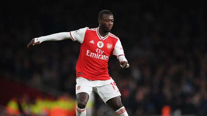 LONDON, ENGLAND - DECEMBER 15: Nicolas Pepe of Arsenal runs with the ball during the Premier League match between Arsenal FC and Manchester City at Emirates Stadium on December 15, 2019 in London, United Kingdom. (Photo by Shaun Botterill/Getty Images) LONDON, ENGLAND - DECEMBER 15: Nicolas Pepe of Arsenal runs with the ball during the Premier League match between Arsenal FC and Manchester City at Emirates Stadium on December 15, 2019 in London, United Kingdom. (Photo by Shaun Botterill/Getty Images)