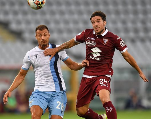 TURIN, ITALY - JUNE 30: Simone Verdi (R) of Torino FC is challenged by Stefan Radu of SS Lazio during the Serie A match between Torino FC and SS Lazio at Stadio Olimpico di Torino on June 30, 2020 in Turin, Italy. (Photo by Valerio Pennicino/Getty Images) TURIN, ITALY - JUNE 30: Simone Verdi (R) of Torino FC is challenged by Stefan Radu of SS Lazio during the Serie A match between Torino FC and SS Lazio at Stadio Olimpico di Torino on June 30, 2020 in Turin, Italy. (Photo by Valerio Pennicino/Getty Images)