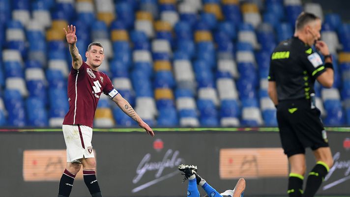 NAPLES, ITALY - DECEMBER 23: Diego Demme of S.S.C. Napoli reacts on the floor as Andrea Belotti of Torino F.C. gestures during the Serie A match between SSC Napoli and Torino FC at Stadio Diego Armando Maradona on December 23, 2020 in Naples, Italy. Sporting stadiums around Italy remain under strict restrictions due to the Coronavirus Pandemic as Government social distancing laws prohibit fans inside venues resulting in games being played behind closed doors. (Photo by Francesco Pecoraro/Getty Images) NAPLES, ITALY - DECEMBER 23: Diego Demme of S.S.C. Napoli reacts on the floor as Andrea Belotti of Torino F.C. gestures during the Serie A match between SSC Napoli and Torino FC at Stadio Diego Armando Maradona on December 23, 2020 in Naples, Italy. Sporting stadiums around Italy remain under strict restrictions due to the Coronavirus Pandemic as Government social distancing laws prohibit fans inside venues resulting in games being played behind closed doors. (Photo by Francesco Pecoraro/Getty Images)
