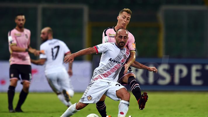 PALERMO, ITALY - AUGUST 31:  Giampietro Perulli (L)  of Cremonese and Nicolas Haas of Palermo compete for the ball during the Serie B match between US Citta' di Palermo and US Cremonese at Stadio Renzo Barbera on August 31, 2018 in Palermo, Italy.  (Photo by Tullio M. Puglia/Getty Images)  PALERMO, ITALY - AUGUST 31:  Giampietro Perulli (L)  of Cremonese and Nicolas Haas of Palermo compete for the ball during the Serie B match between US Citta' di Palermo and US Cremonese at Stadio Renzo Barbera on August 31, 2018 in Palermo, Italy.  (Photo by Tullio M. Puglia/Getty Images)