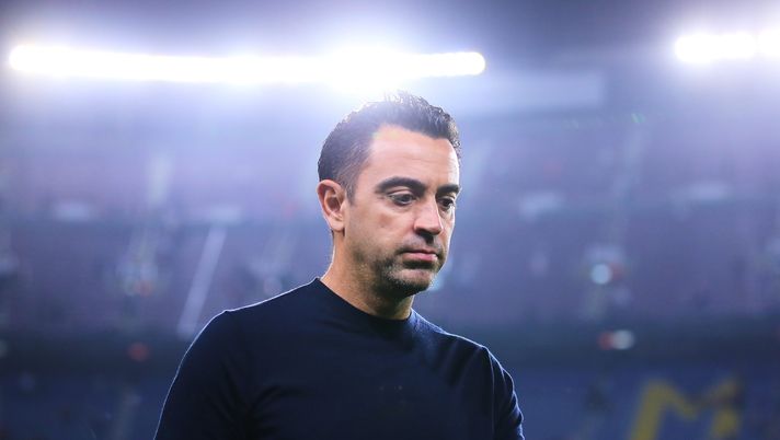 BARCELONA, SPAIN - OCTOBER 26: Xavi Hernandez, head coach of FC Barcelona looks dejected following their side's defeat and elimination from the UEFA Champions League in the UEFA Champions League group C match between FC Barcelona and FC Bayern München at Spotify Camp Nou on October 26, 2022 in Barcelona, Spain. (Photo by Eric Alonso/Getty Images) Xavi