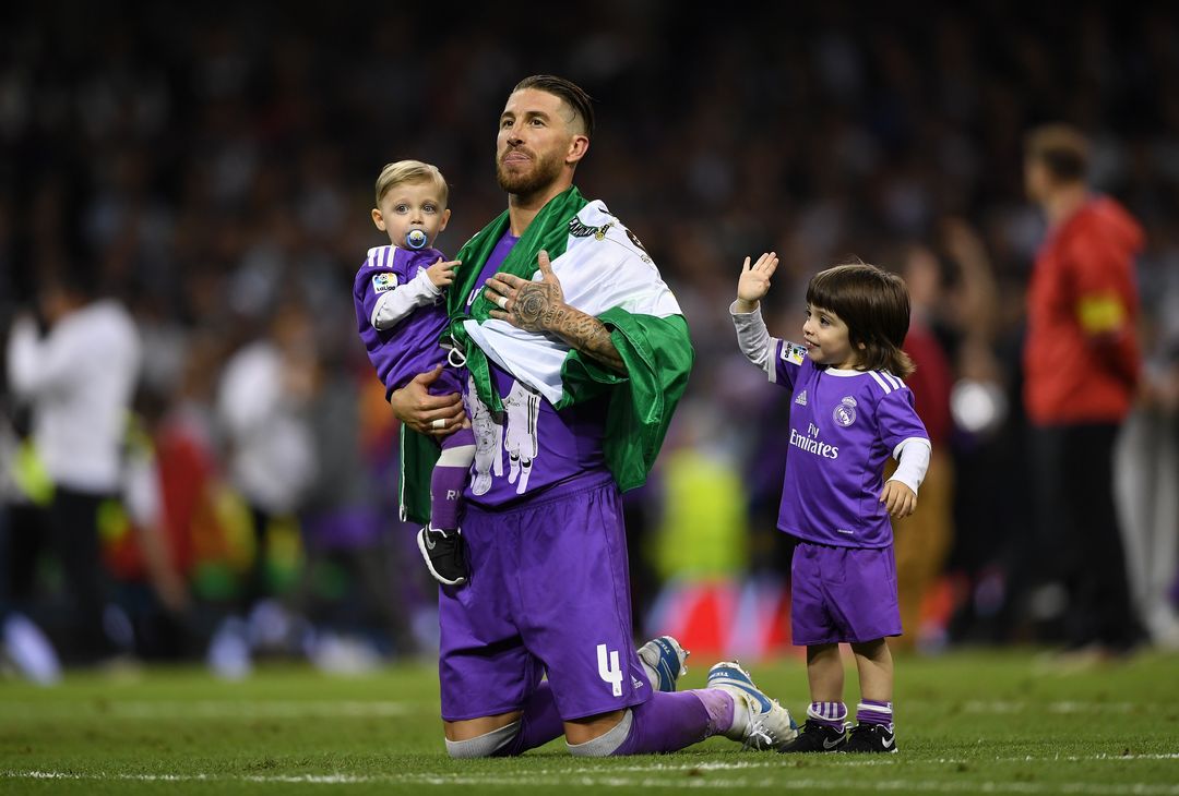  CARDIFF, WALES - JUNE 03:  Sergio Ramos of Real Madrid celebrates victory with his children after the UEFA Champions League Final between Juventus and Real Madrid at National Stadium of Wales on June 3, 2017 in Cardiff, Wales.  (Photo by Shaun Botterill/Getty Images) 