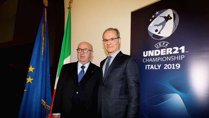 ROME, ITALY - MARCH 01: FIGC President Carlo Tavecchio and UEFA Deputy General Secretary Giorgio Marchetti pose during a Italian Football Federation (FIGC) press conference on ' UEFA Euro U21 2019 Finals' on March 1, 2017 in Rome, Italy. (Photo by Paolo Bruno/Getty Images) ROME, ITALY - MARCH 01: FIGC President Carlo Tavecchio and UEFA Deputy General Secretary Giorgio Marchetti pose during a Italian Football Federation (FIGC) press conference on ' UEFA Euro U21 2019 Finals' on March 1, 2017 in Rome, Italy. (Photo by Paolo Bruno/Getty Images)