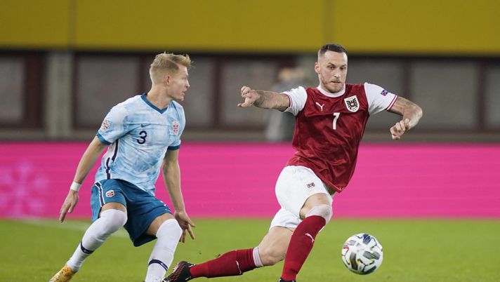 VIENNA, AUSTRIA - NOVEMBER 18: Marko Arnautovic of Austria is challenged by Andreas HancheOlsen of Norway during the UEFA Nations League group stage match between Austria and Norway at Ernst Happel Stadion on November 18, 2020 in Vienna, Austria. Football Stadiums around Europe remain empty due to the Coronavirus Pandemic as Government social distancing laws prohibit fans inside venues resulting in fixtures being played behind closed doors. (Photo by Christian Hofer/Getty Images) VIENNA, AUSTRIA - NOVEMBER 18: Marko Arnautovic of Austria is challenged by Andreas HancheOlsen of Norway during the UEFA Nations League group stage match between Austria and Norway at Ernst Happel Stadion on November 18, 2020 in Vienna, Austria. Football Stadiums around Europe remain empty due to the Coronavirus Pandemic as Government social distancing laws prohibit fans inside venues resulting in fixtures being played behind closed doors. (Photo by Christian Hofer/Getty Images)