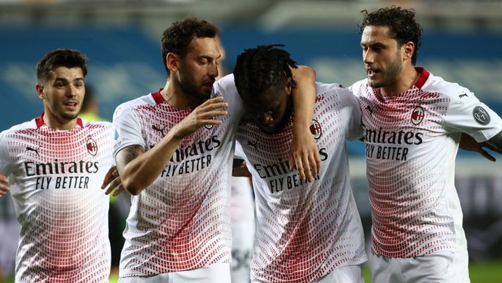 BERGAMO, ITALY - MAY 23: Franck Kessie of A.C. Milan celebrates with team mates Hakan Calhanoglu and Davide Calabria after scoring his team's first goal during the Serie A match between Atalanta BC and AC Milan at Gewiss Stadium on May 23, 2021 in Bergamo, Italy. Sporting stadiums around Italy remain under strict restrictions due to the Coronavirus Pandemic as Government social distancing laws prohibit fans inside venues resulting in games being played behind closed doors. (Photo by Marco Luzzani/Getty Images) BERGAMO, ITALY - MAY 23: Franck Kessie of A.C. Milan celebrates with team mates Hakan Calhanoglu and Davide Calabria after scoring his team's first goal during the Serie A match between Atalanta BC and AC Milan at Gewiss Stadium on May 23, 2021 in Bergamo, Italy. Sporting stadiums around Italy remain under strict restrictions due to the Coronavirus Pandemic as Government social distancing laws prohibit fans inside venues resulting in games being played behind closed doors. (Photo by Marco Luzzani/Getty Images)