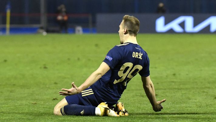 ZAGREB, CROATIA - MARCH 18: Mislav Orsic of GNK Dinamo Zagreb celebrates after scoring their side's third goal and his hat-trick during the UEFA Europa League Round of 16 Second Leg match between Dinamo Zagreb and Tottenham Hotspur at Stadion Maksimir on March 18, 2021 in Zagreb, Croatia. Sporting stadiums around Europe remain under strict restrictions due to the Coronavirus Pandemic as Government social distancing laws prohibit fans inside venues resulting in games being played behind closed doors. (Photo by Jurij Kodrun/Getty Images) ZAGREB, CROATIA - MARCH 18: Mislav Orsic of GNK Dinamo Zagreb celebrates after scoring their side's third goal and his hat-trick during the UEFA Europa League Round of 16 Second Leg match between Dinamo Zagreb and Tottenham Hotspur at Stadion Maksimir on March 18, 2021 in Zagreb, Croatia. Sporting stadiums around Europe remain under strict restrictions due to the Coronavirus Pandemic as Government social distancing laws prohibit fans inside venues resulting in games being played behind closed doors. (Photo by Jurij Kodrun/Getty Images)