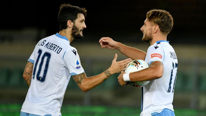 VERONA, ITALY - JULY 26: Ciro Immobile of SS Lazio celebrates a fifth goal with Luis Alberto during the Serie A match between Hellas Verona and SS Lazio at Stadio Marcantonio Bentegodi on July 26, 2020 in Verona, Italy. (Photo by Marco Rosi - SS Lazio/Getty Images) VERONA, ITALY - JULY 26: Ciro Immobile of SS Lazio celebrates a fifth goal with Luis Alberto during the Serie A match between Hellas Verona and SS Lazio at Stadio Marcantonio Bentegodi on July 26, 2020 in Verona, Italy. (Photo by Marco Rosi - SS Lazio/Getty Images)