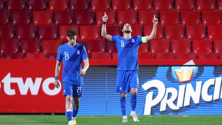 GRANADA, SPAIN - MARCH 25: Tasos Bakasetas of Greece celebrates after scoring their side's first goal during the FIFA World Cup 2022 Qatar qualifying match between Spain and Greece on March 25, 2021 in Granada, Spain. Sporting stadiums around Spain remain under strict restrictions due to the Coronavirus Pandemic as Government social distancing laws prohibit fans inside venues resulting in games being played behind closed doors. (Photo by Fran Santiago/Getty Images)