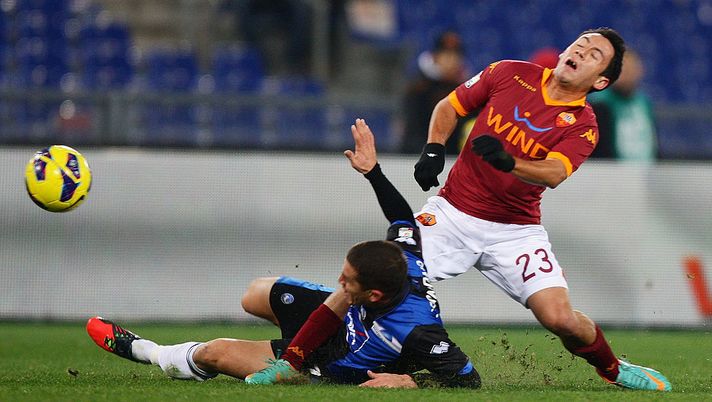 ROME, ITALY - DECEMBER 11: Ivan Piris(R) of AS Roma competes for the ball with Carlos Carmona of Atalanta BC during the TIM Cup match between AS Roma and Atalanta BC at Olimpico Stadium on December 11, 2012 in Rome, Italy. (Photo by Paolo Bruno/Getty Images) ROME, ITALY - DECEMBER 11: Ivan Piris(R) of AS Roma competes for the ball with Carlos Carmona of Atalanta BC during the TIM Cup match between AS Roma and Atalanta BC at Olimpico Stadium on December 11, 2012 in Rome, Italy. (Photo by Paolo Bruno/Getty Images)