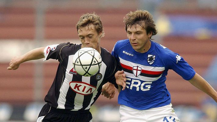 UDINE, ITALY - MAY 15: Vitaly Kutuzov of Sampdoria tackles Per Kroldrup of Udinese during the Serie A match between Udinese and Sampdoria at at Friuli Stadium May 15, 2005 in Udine, Italy. (Photo by New Press/Getty Images) 