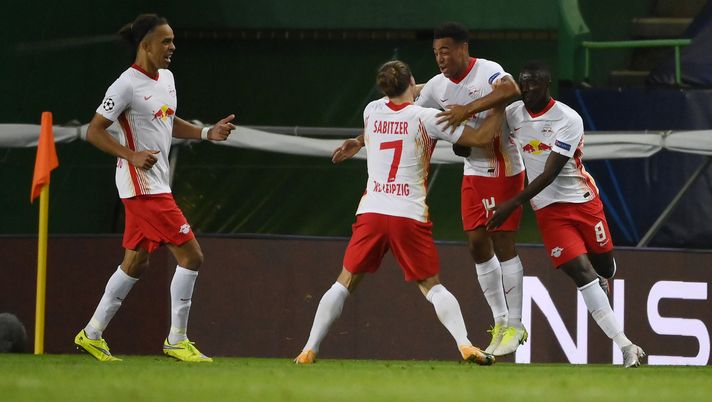 LISBON, PORTUGAL - AUGUST 13: Tyler Adams of RB Leipzig celebrates with teammates after scoring his team's second goal during the UEFA Champions League Quarter Final match between RB Leipzig and Club Atletico de Madrid at Estadio Jose Alvalade on August 13, 2020 in Lisbon, Portugal. (Photo by Lluis Gene/Getty Images) LISBON, PORTUGAL - AUGUST 13: Tyler Adams of RB Leipzig celebrates with teammates after scoring his team's second goal during the UEFA Champions League Quarter Final match between RB Leipzig and Club Atletico de Madrid at Estadio Jose Alvalade on August 13, 2020 in Lisbon, Portugal. (Photo by Lluis Gene/Getty Images)