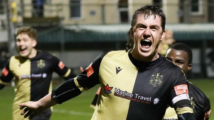 Tom Clarke del Marine AFC nella foto di Pro Sports Images Ltd. Tom Clarke del Marine AFC nella foto di Pro Sports Images Ltd.