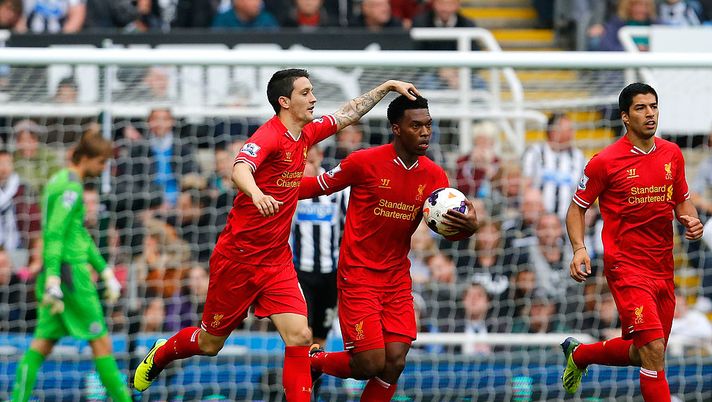 NEWCASTLE-UPON-TYNE, ENGLAND - OCTOBER 19: Daniel Sturridge (C) of Liverpool celebrates scoring his team's second goal with team-mate Luis Alberto during the Barclays Premier League match between Newcastle United and Liverpool at St James' Park on October 19, 2013 in Newcastle-Upon-Tyne, England. (Photo by Paul Thomas/Getty Images) NEWCASTLE-UPON-TYNE, ENGLAND - OCTOBER 19: Daniel Sturridge (C) of Liverpool celebrates scoring his team's second goal with team-mate Luis Alberto during the Barclays Premier League match between Newcastle United and Liverpool at St James' Park on October 19, 2013 in Newcastle-Upon-Tyne, England. (Photo by Paul Thomas/Getty Images)